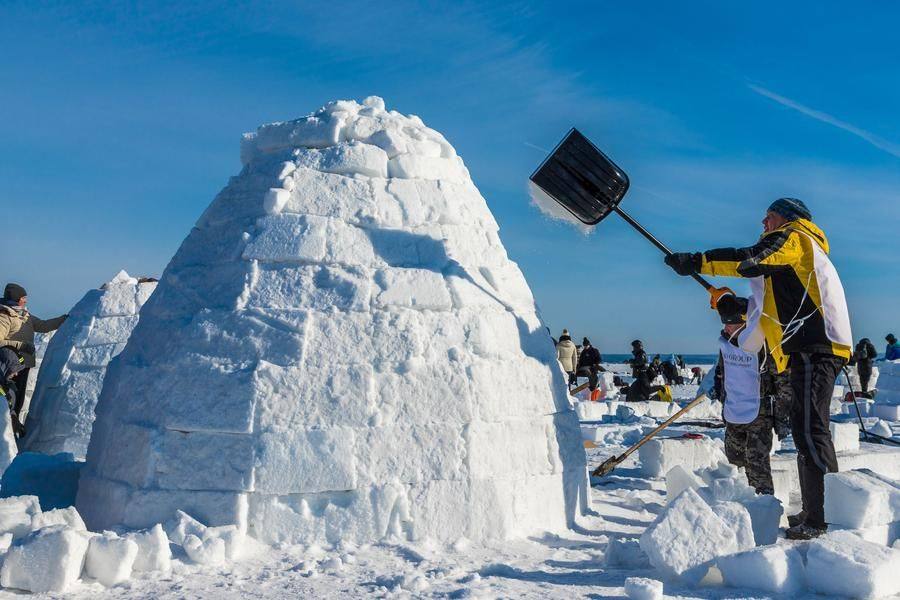 But back to our observations: another hut is being covered with snow to hide any gaps