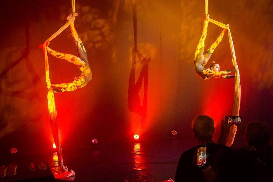 Aria Gartung and Alena Strelnikova (“Art of Fly” studio from Omsk) perform on aerial silks