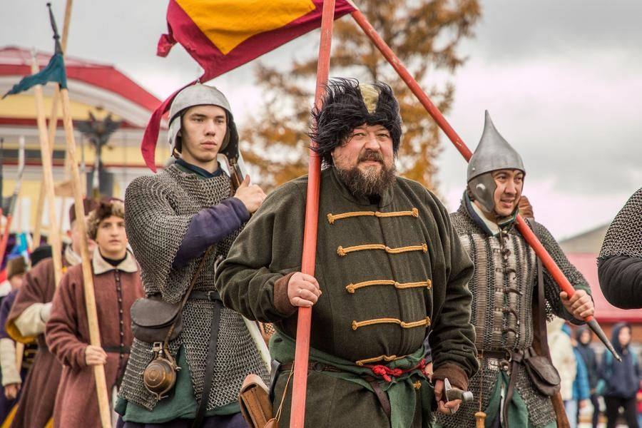 The reenactors take up their positions