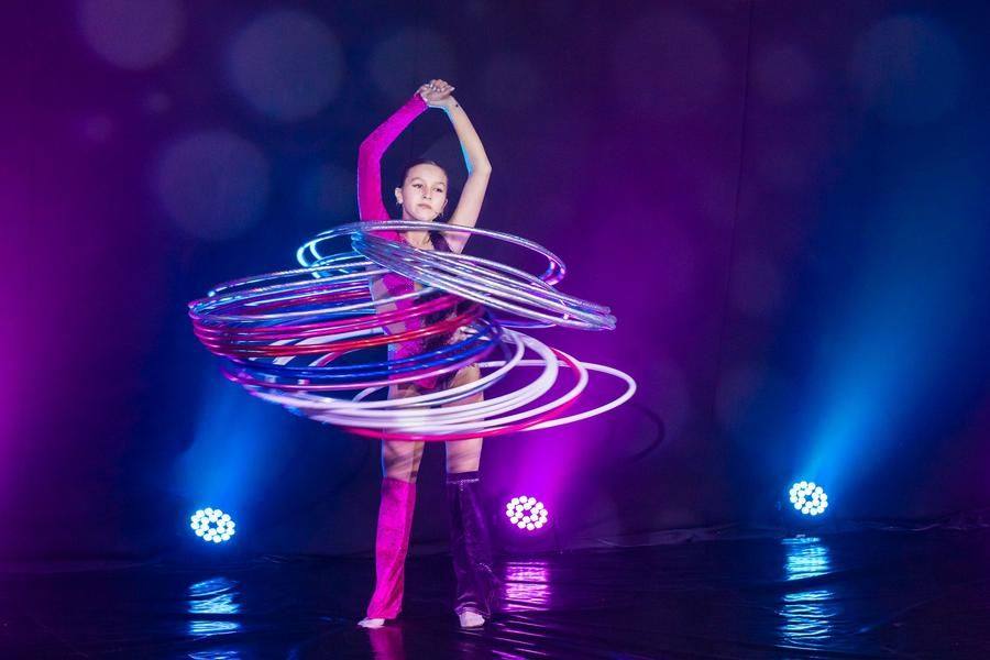 Spinning hoops at different body levels always looks breathtaking