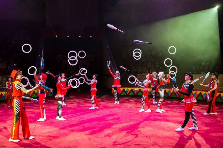 In a minute, the arena fills with jugglers