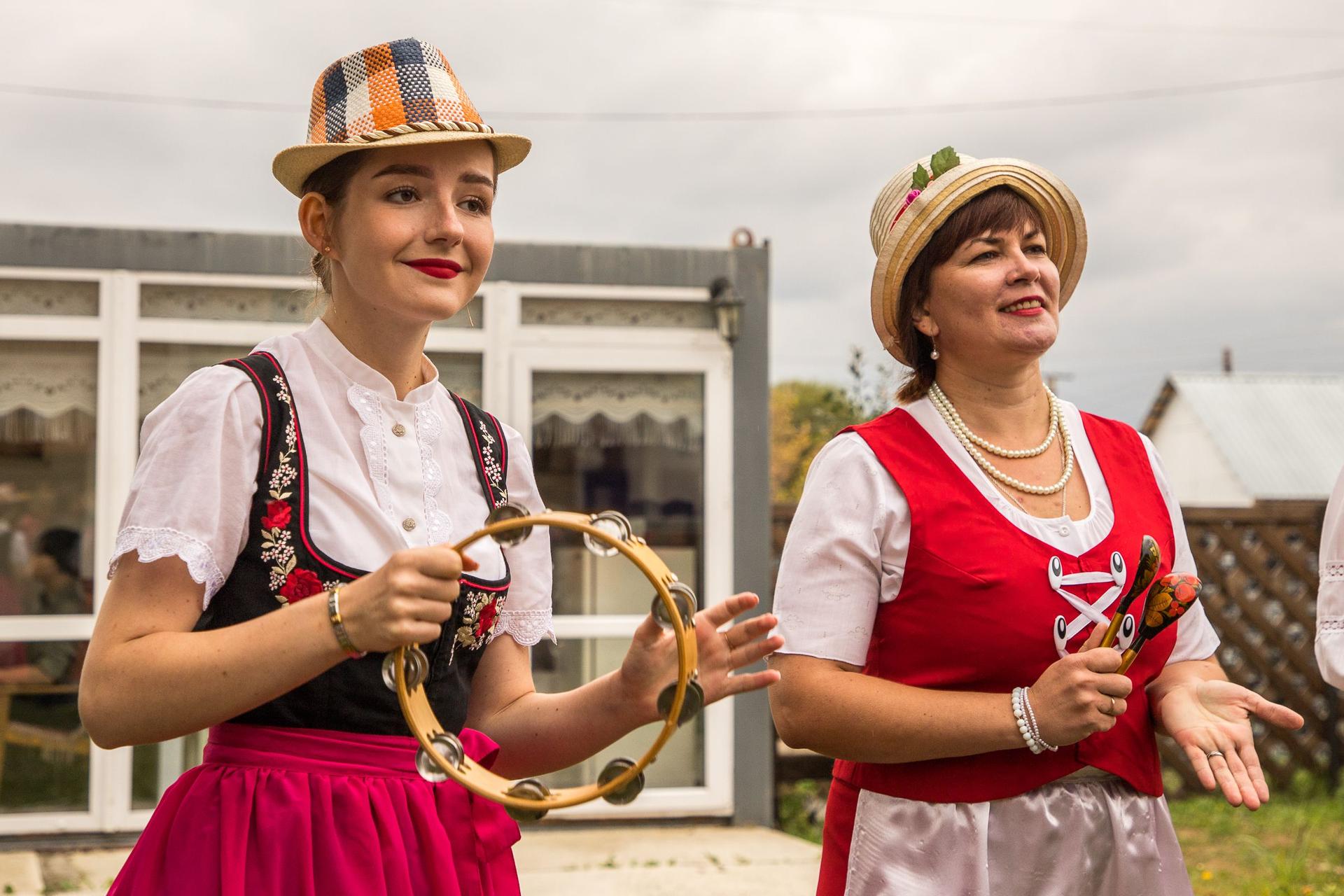 The performers add a distinctly authentic national flavor to the whole process