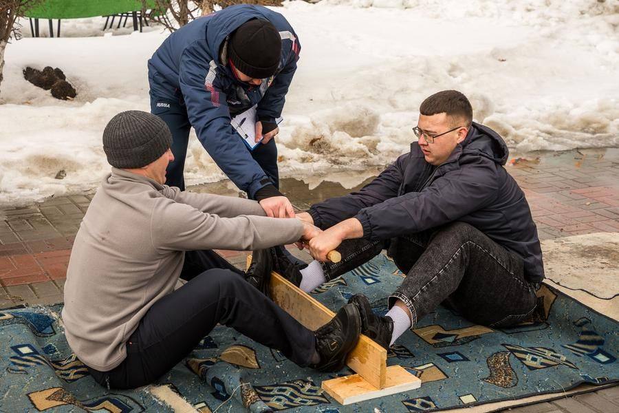 This is mas‑wrestling, a national sport of Yakutia known since the 17th century